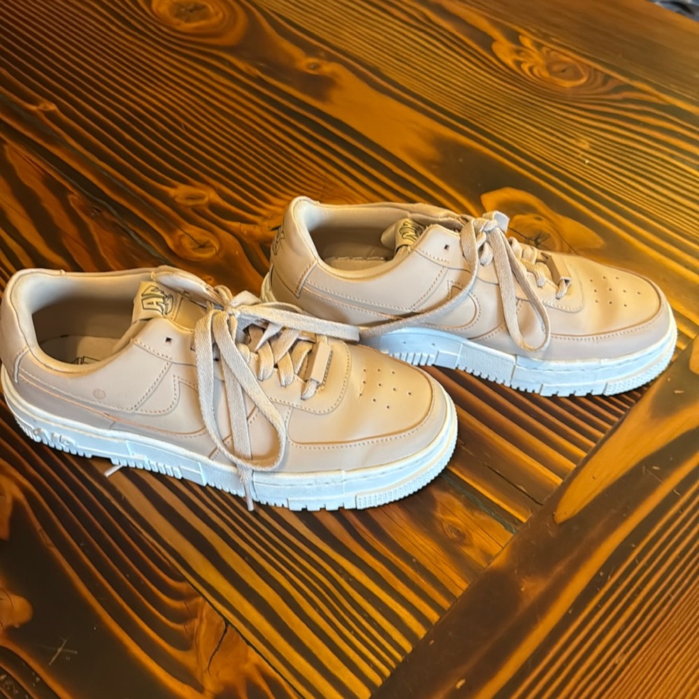 Nike Air Force thick soled shoes.
